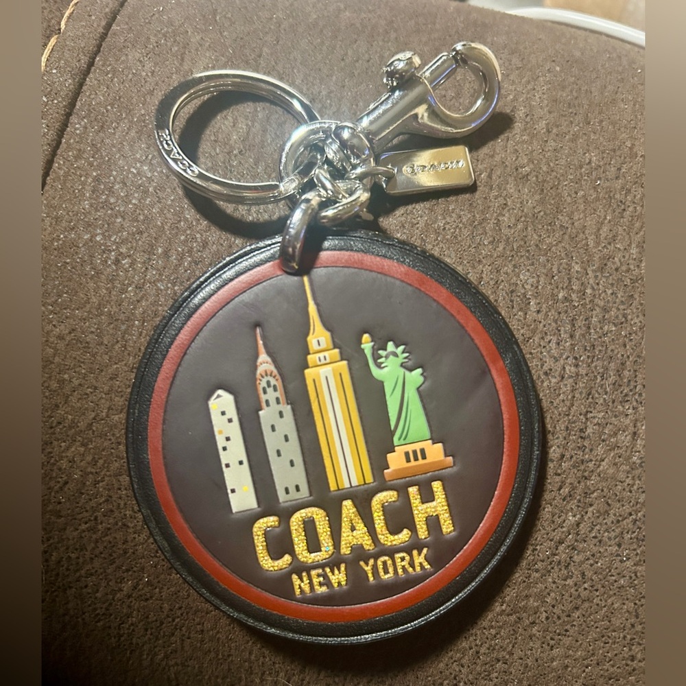 Coach Black and Brown New York Keychain smoking husband ( he’s not hot)
